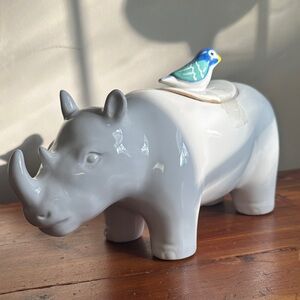 Elegant Gray and White Rhino Figurine with Blue Bird Accent
